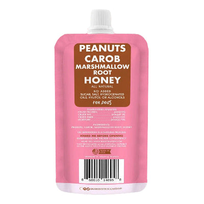 Pink pet peanut butter pouch with brown label on a white background