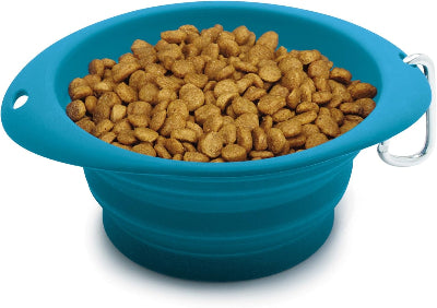 Blue silicone pet bowl filled with kibble on a white background
