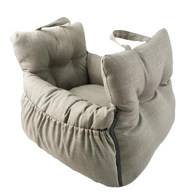 Gray pet bed with cushioned headrests on a white background
