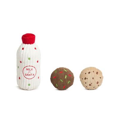 Dog toy set with a bottle labeled 'Milk for Santa' and two cookies on a white background