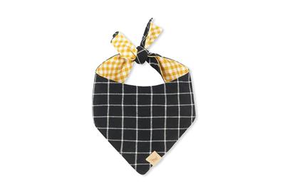 Black and white checkered bandana with yellow plaid bow on a white background