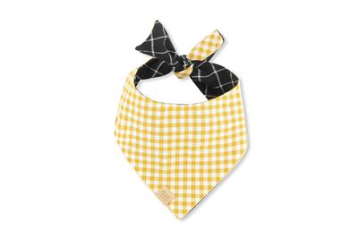 Yellow checkered bandana with black patterned bow on a white background