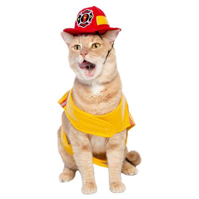 Cat wearing a fireman costume with a red & yellow hat on a white background