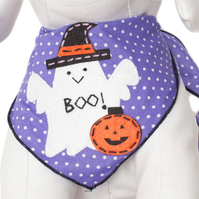 Halloween-themed bandana with ghost, pumpkin, and witch hat design on a purple polka dot background.