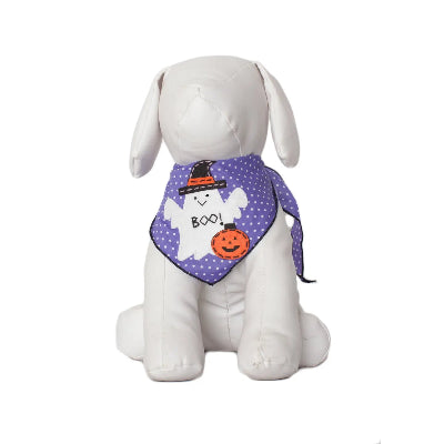 White dog wearing a Halloween-themed purple bandana with ghost, pumpkin, and witch hat designs on a white background.