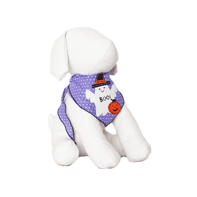 White dog wearing a purple Halloween-themed bandana on a white background
