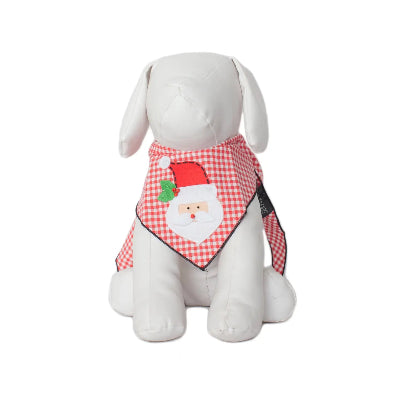 White dog wearing a red and white checkered bandana with a Santa Claus design on a white background