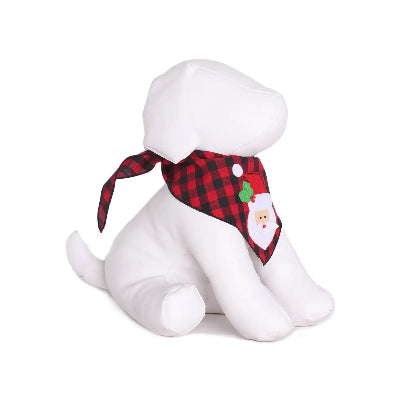 White dog figurine wearing a red plaid bandana with a Santa Claus design on a white background