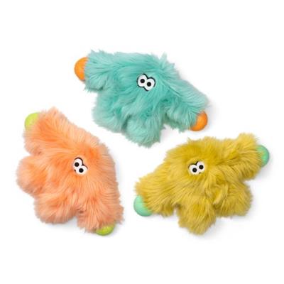 Three colorful plush toys on a white background