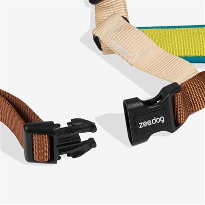 Dog Harness with black clips, one beige and one brown, on a white background. Zeedog branding is visible.
