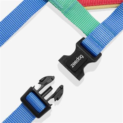 Close-up of a blue and green strap with a black clip labeled 'zeedog' on a white background.