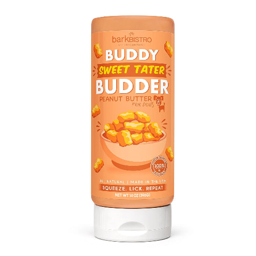 Orange squeeze bottle of Bark Bistro Sweet Tater Buddy Budder Peanut Butter for dogs on white background.