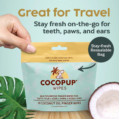 Cocopup wipes packaging with a hand holding it, coconut, and text about travel use.