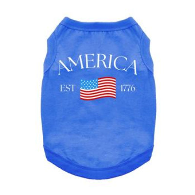 Blue pet shirt with 'AMERICA EST. 1776' text and American flag on a white background