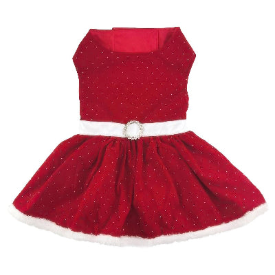 Red velvet dog dress with sparkles featuring white belt with rhinestone buckle and white faux fur trim on white background.