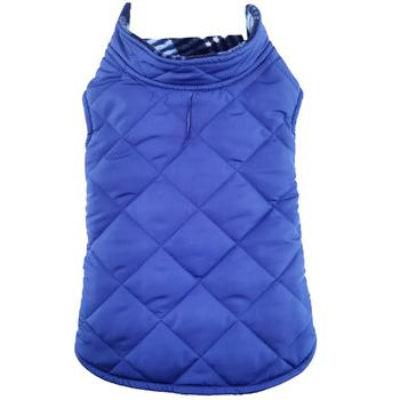 Blue quilted dog vest on a white background