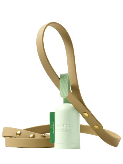 Light green pet waste bag holder with beige strap on a white background