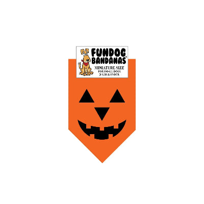 Orange dog bandana with black jack-o'-lantern design on a white background, featuring 'Fundog Bandanas' branding.