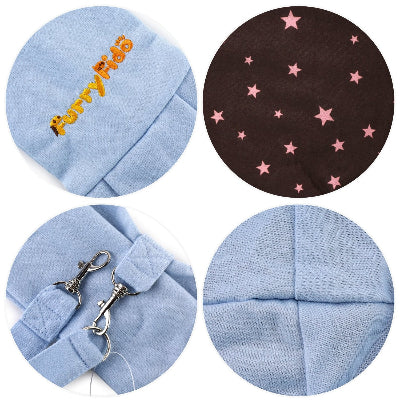 Four circular detail close-ups of a light blue fabric pet sling, showing embroidered orange text, a dark brown fabric section with pink stars, metal clips, and stitched fabric texture.