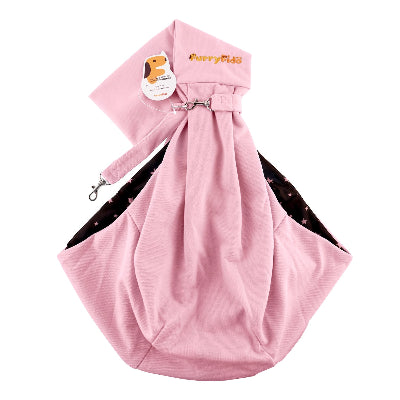 A pink pet carrier bag with a strap, featuring a black patterned lining visible on the sides and a small embroidered dog logo with the text 'FurryFido' on the strap.