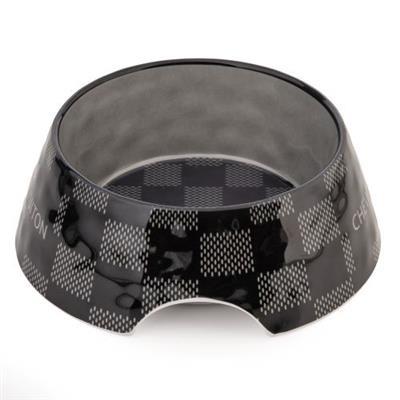 Black and white checkered dog bowl on a white background
