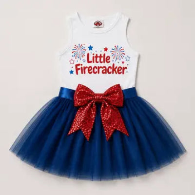Pet dress with 'Little Firecracker' text and red bow on a light background