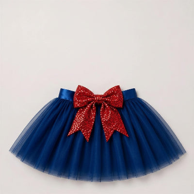 Blue tutu skirt with a red sequin bow on a light gray background