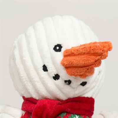 Snowman dog toy with a carrot nose on a light gray background