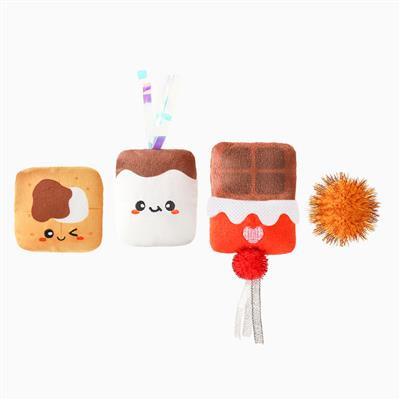 Set of four plush toys shaped like cookies on a white background