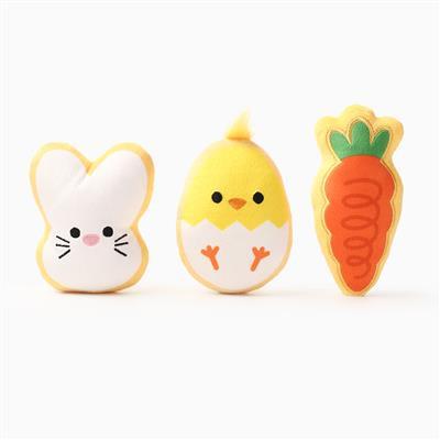 Three cute cookie-shaped toys resembling a bunny, chick, and carrot on a white background