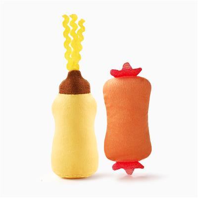 Two plush toys resembling a hot dog and mustard on a white background