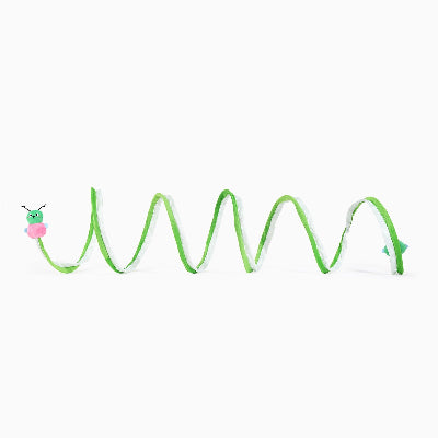 Green spiral toy with a small figure at each end on a white background