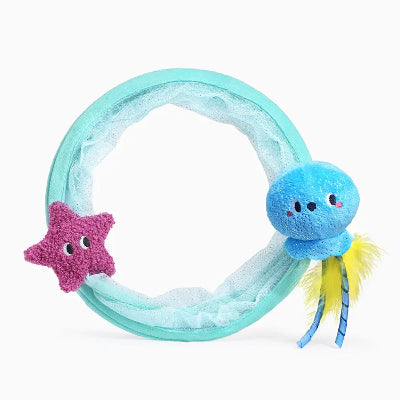 Toy ring with a blue jellyfish, pink starfish, and yellow tail on a white background