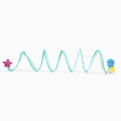 Toy spring with a star-shaped object on one end and a blue creature-like object on the other, on a white background.