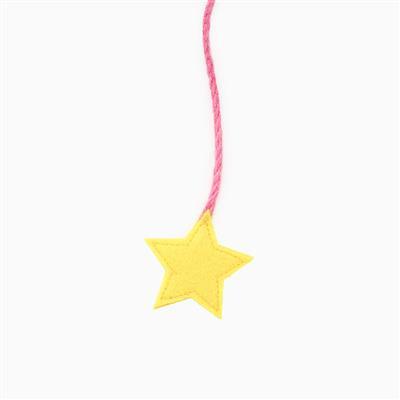Yellow star-shaped pendant on a pink string against a white background