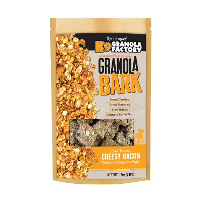 Package of Granola Factory Cheesy Bacon granola bark for dogs on a white background