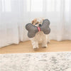 Dog carrying bone shaped dog toy