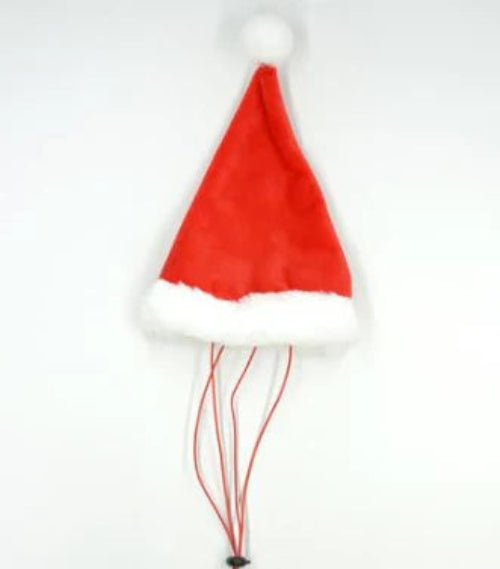 Red dog Santa hat with white fur trim and pom pom with chin straps on white background.