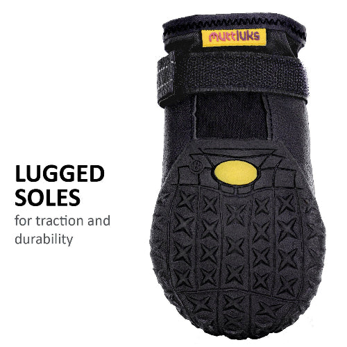 Sole of Muttluks dog shoes on white background.