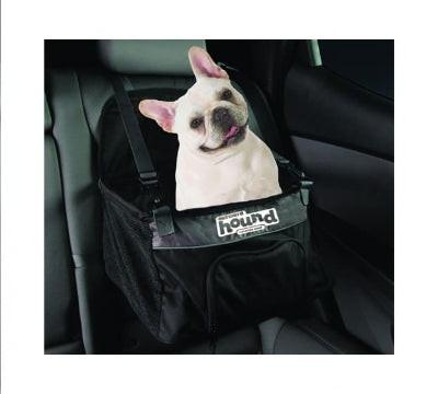 Dog sitting in a car seat with a 'My Dog is a Hound' label