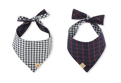 Two dog bandanas with plaid patterns on a white background