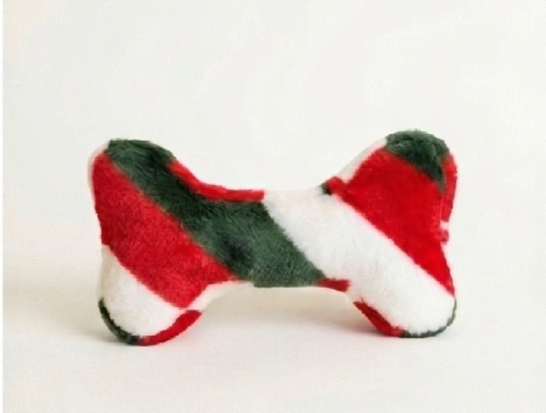 Red, white & green bone shaped plush dog toy on white background.