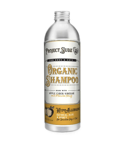 Project Sudz Organic Shampoo for Dogs & Cats in a tall silver bottle with a white and gold label, shown on a plain white background.