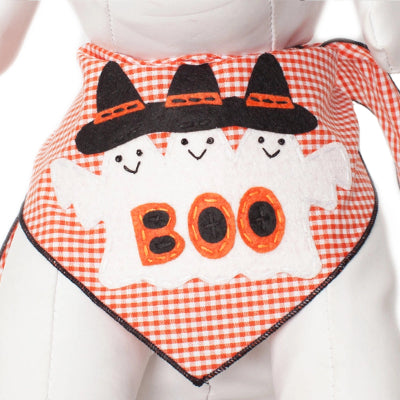 A Halloween-themed bandana bib with a orange and white gingham pattern, featuring three embroidered white ghosts wearing black witch hats and the word 'BOO' in orange.