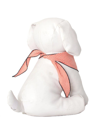 A white plush dog shown from the back, wearing an orange and white gingham scarf with black trim, on a plain white background.