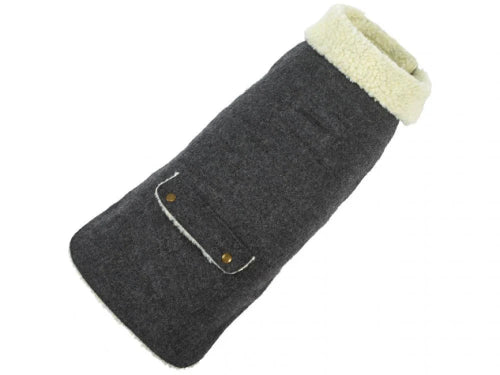 Gray wool dog coat with ivory sherpa lining on white background.