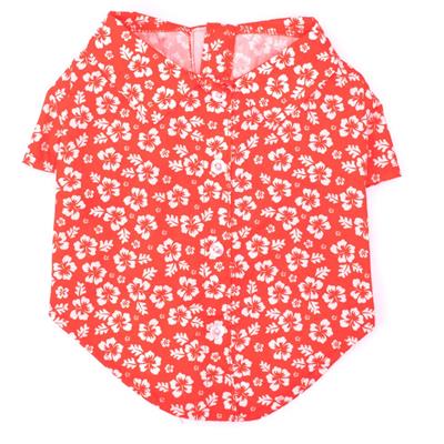 Red shirt with white Hawaiian themed flowers on white background.