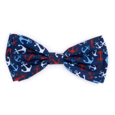 Nautical-themed bow tie with anchors on a blue background