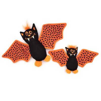 Two Halloween-themed dog toys with orange and black bat patterns on a white background