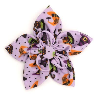 Halloween-themed flower accessory with purple and orange design on a white background